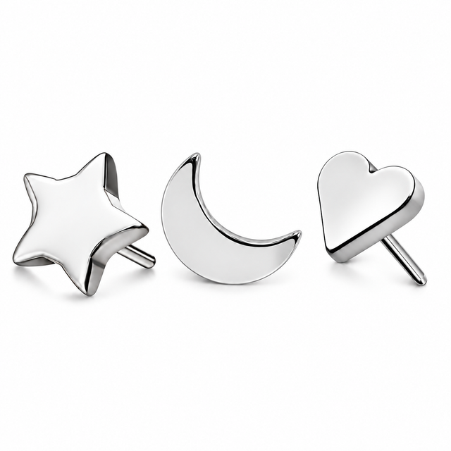 Piercing_in_titanio_stella_luna_e_cuore
