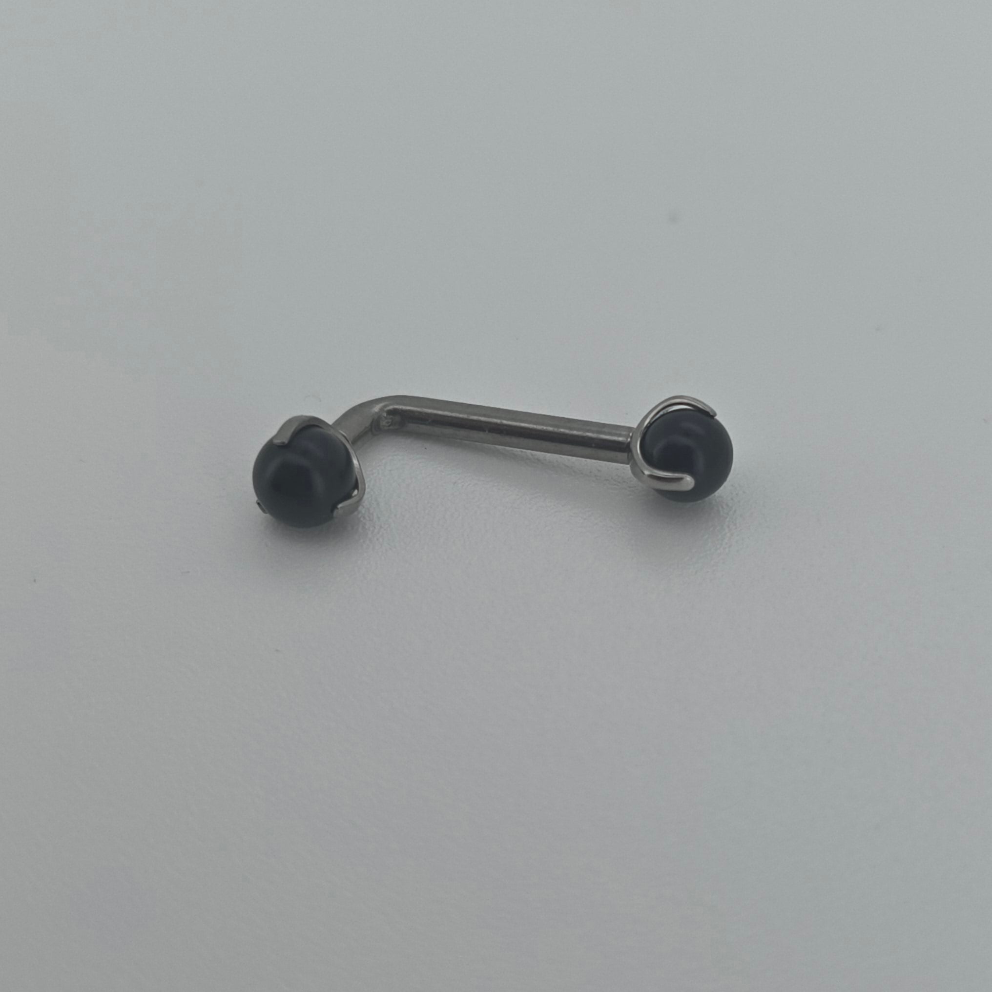 Piercing Christina pietra Nera