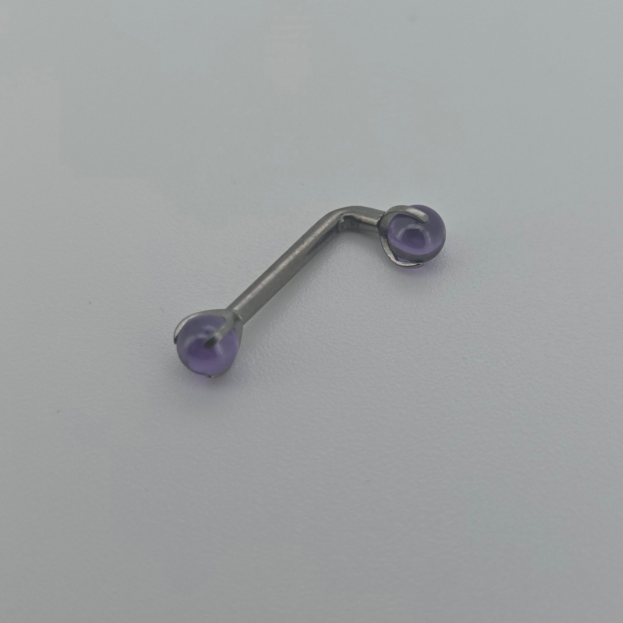 Piercing Christina pietra Viola