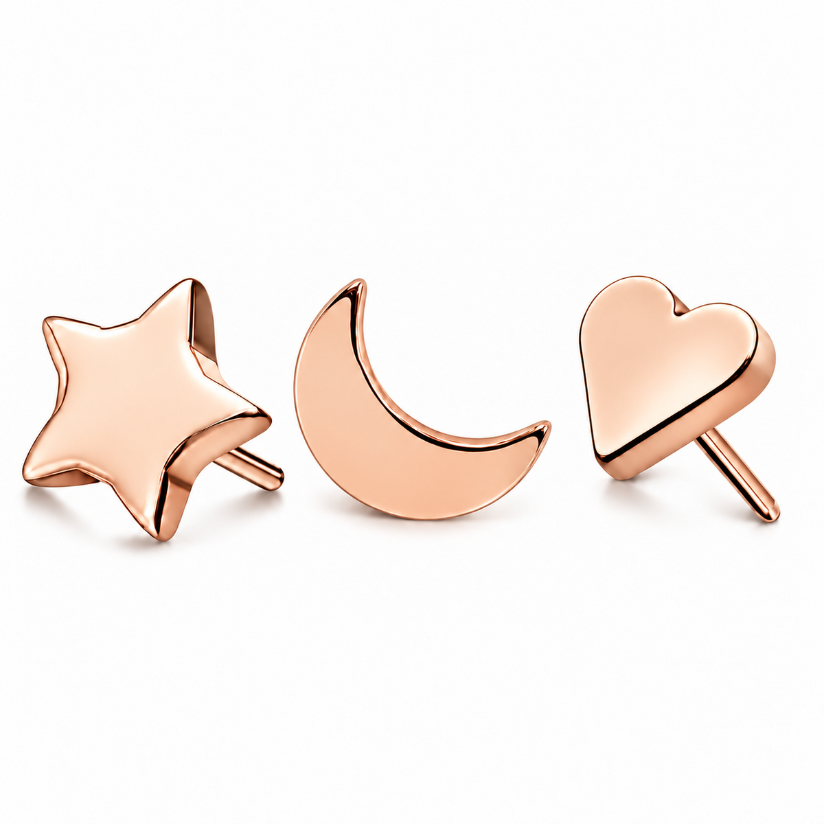 Piercing_in_titanio_stella_luna_e_cuore_oro rosa
